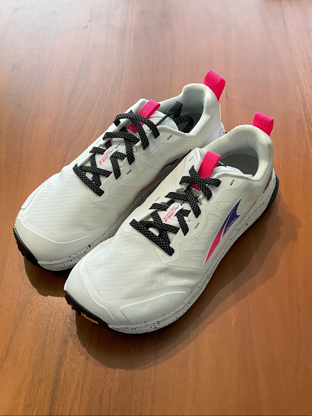 Lone peak 9+ Altra Women's White Running Shoes with Pink and Black sample